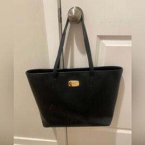 Michael Kors tote bag with laptop sleep. Like new condition!
